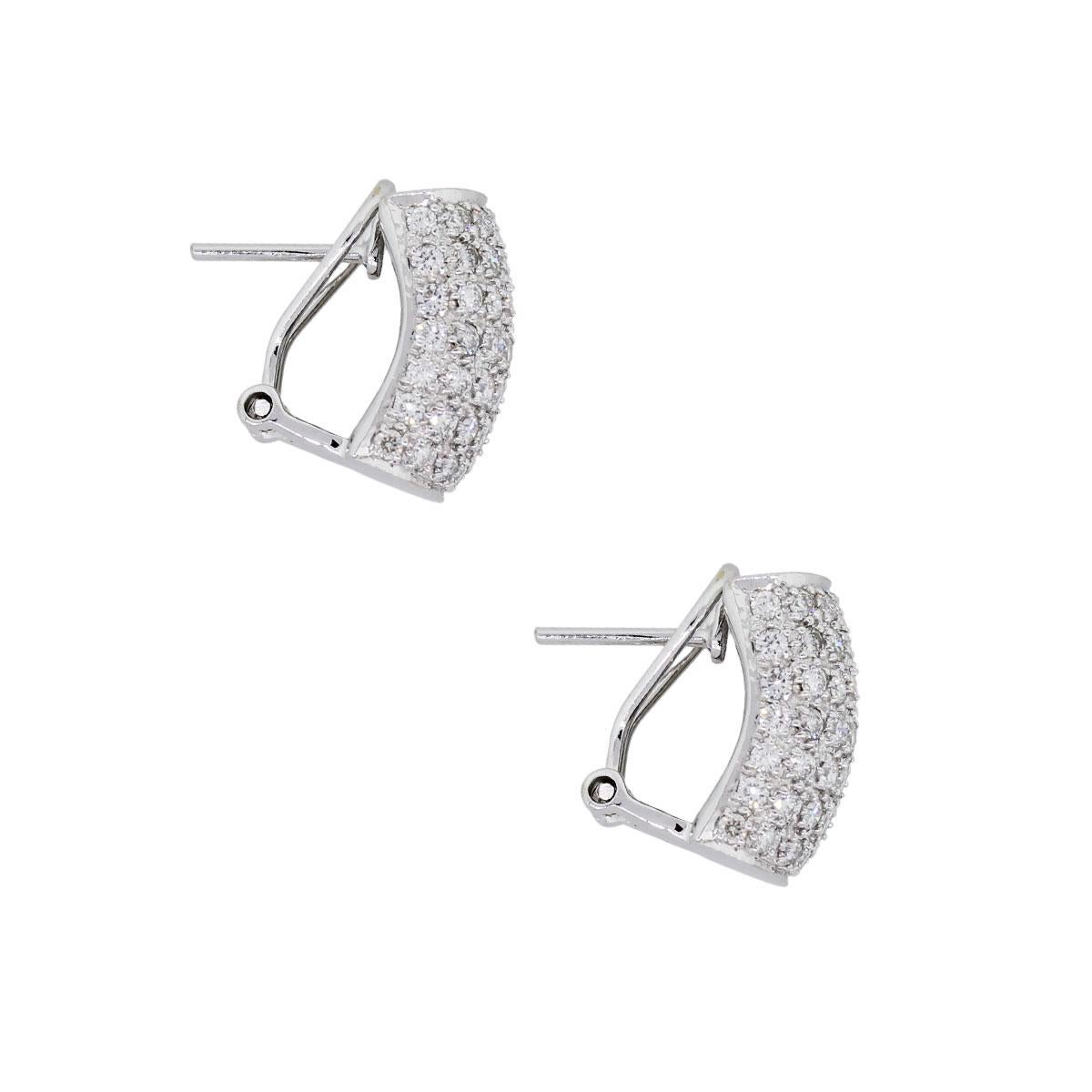 Material: 18k white gold
Diamond Details: Approx. 1.47ctw of round diamonds. Diamond color is G/H and SI clarity.
Measurements: 0.61″ x 0.38″ x 0.48″
Earring Backs: Omega back
Total Weight: 8.3g (5.3dwt)
Additional Details: This item comes with a