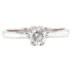 Round brilliant diamond solitaire engagement ring 18k white gold