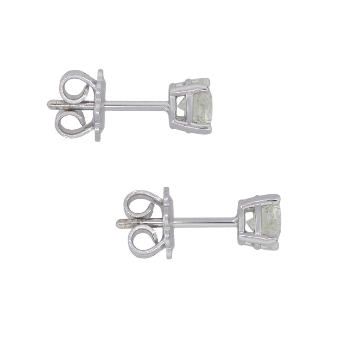 Material: 14k white gold
Diamond Detail: Approximately 1.33ctw of round brilliant diamonds. Diamonds are I/J in color, I1 in clarity
Measurements: 0.59″ x 0.20″ x 0.20″
Earrings Backs: Post friction
Total Weight: 2g (1.3dwt)
Additional Details: This