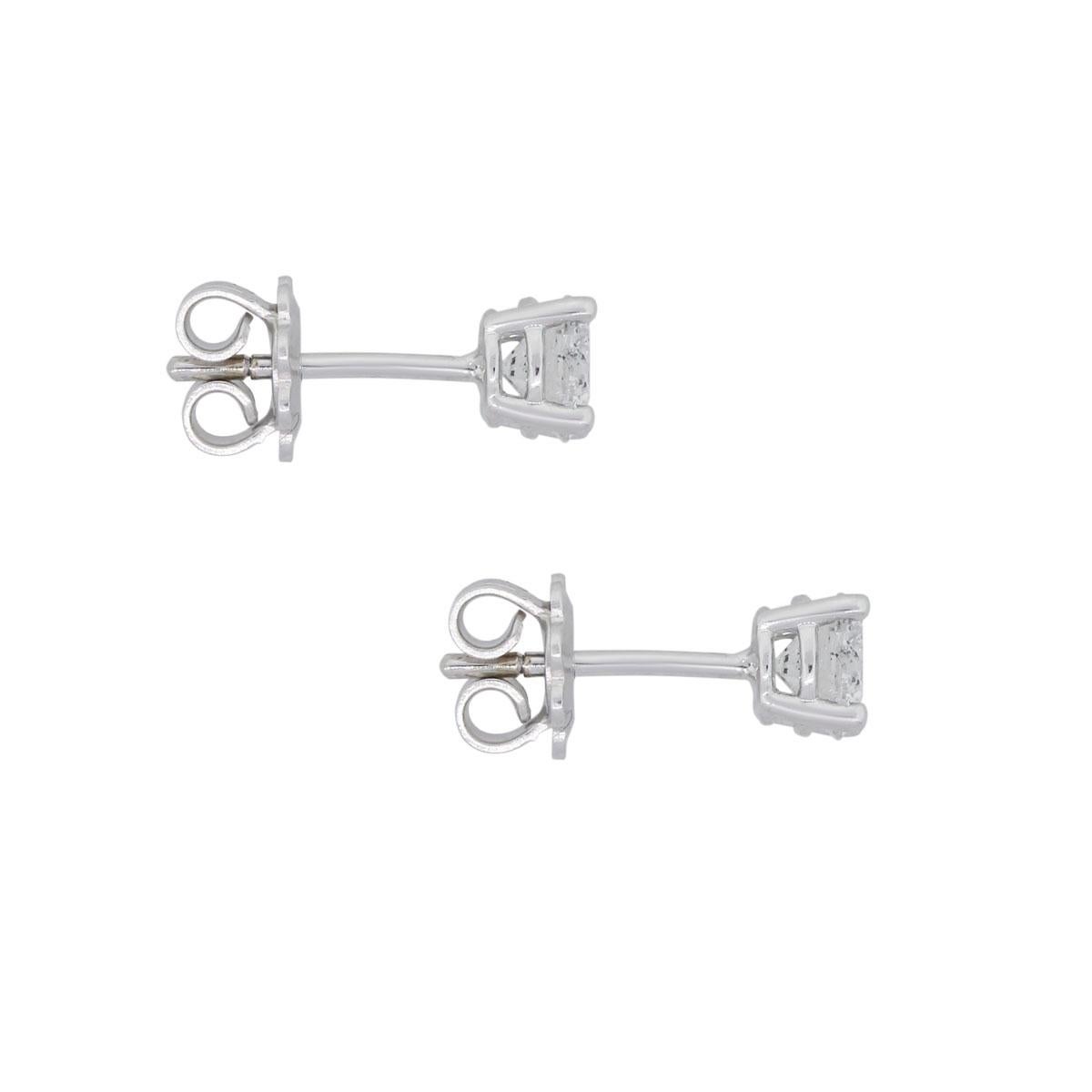 Material: 14k white gold
Diamond Details: Approximately 1.53ctw of round brilliant diamonds. Diamonds are F/G in color, SI3 in clarity
Measurements: 0.63″ x 0.21″ x 0.21″
Earrings Backs: Post friction
Total Weight: 2.1g (1.3dwt)
Additional Details: