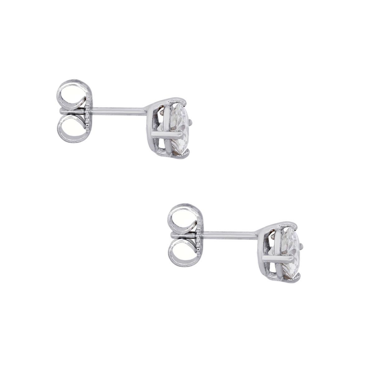 Material: 14k white gold
Diamond Details: Approximately 1.10ctw of round brilliant diamonds. Diamonds are G/H in color and SI in clarity
Earring Measurements: 0.53″ x 0.20″ x 0.20″
Total Weight: 1.2g (0.7dwt)
Earring backs: Post friction
Additional