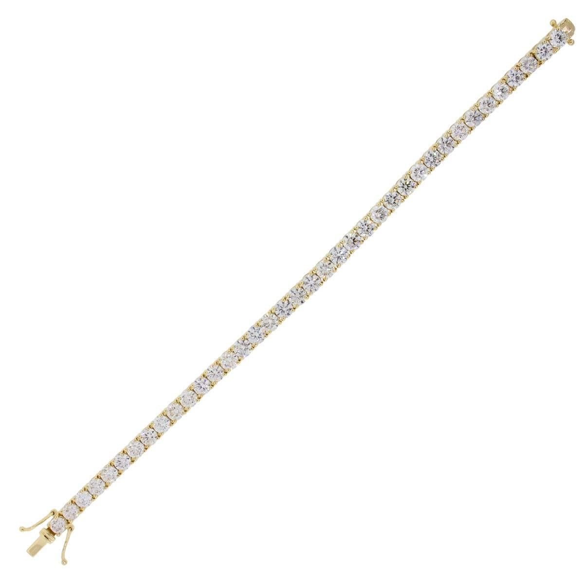 Material: 14k yellow gold
Diamond Details: Approximately 13.03ctw of round brilliant diamonds. Diamonds are H in color and VS-SI in clarity. 38 diamonds total
Clasp: Tongue in box clasp with safety latch
Measurements: Will fit a 7.25″ wrist and is