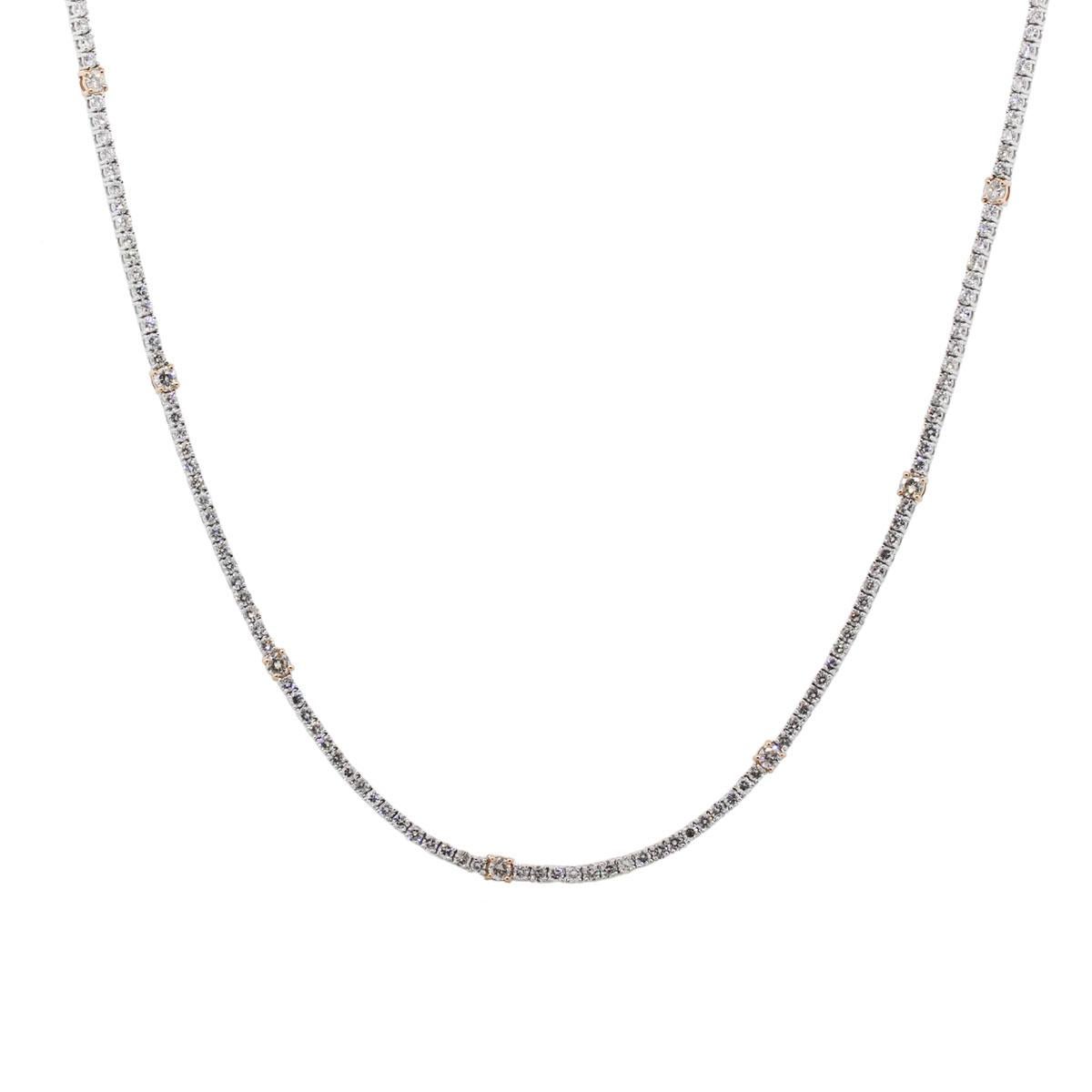 Material: 14k white and rose gold
Diamond Details: Approximately 6ctw of round brilliant diamonds, DIamonds are H/I in color, SI-I in clarity
Measurements: Necklace measures 20″
Fastening: Tongue in box clasp with safety latch
Item Weight: 17.1g