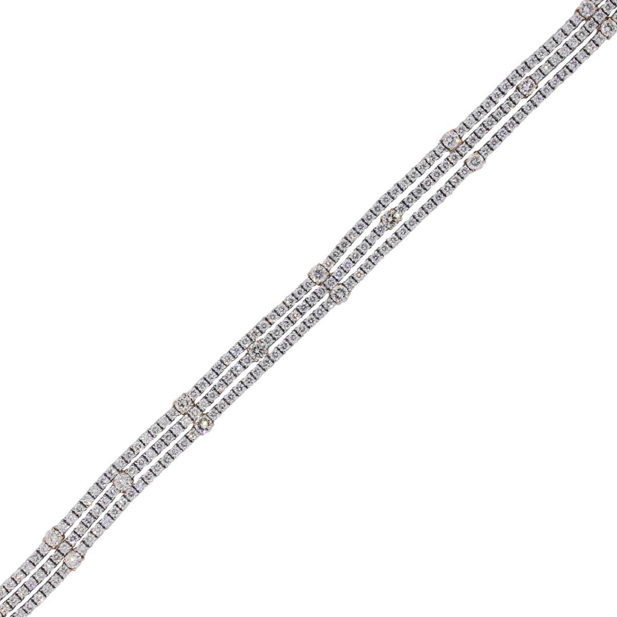 Material: 14k white gold
Diamond Details: Approximately 7ctw of round brilliant diamonds. Diamonds are H/I in color, SI in clarity
Clasp: Tongue in box clasp with safety latch
Measurement: 7″ in length
Total Weight: 18.5g (12dwt)
Additional Details: