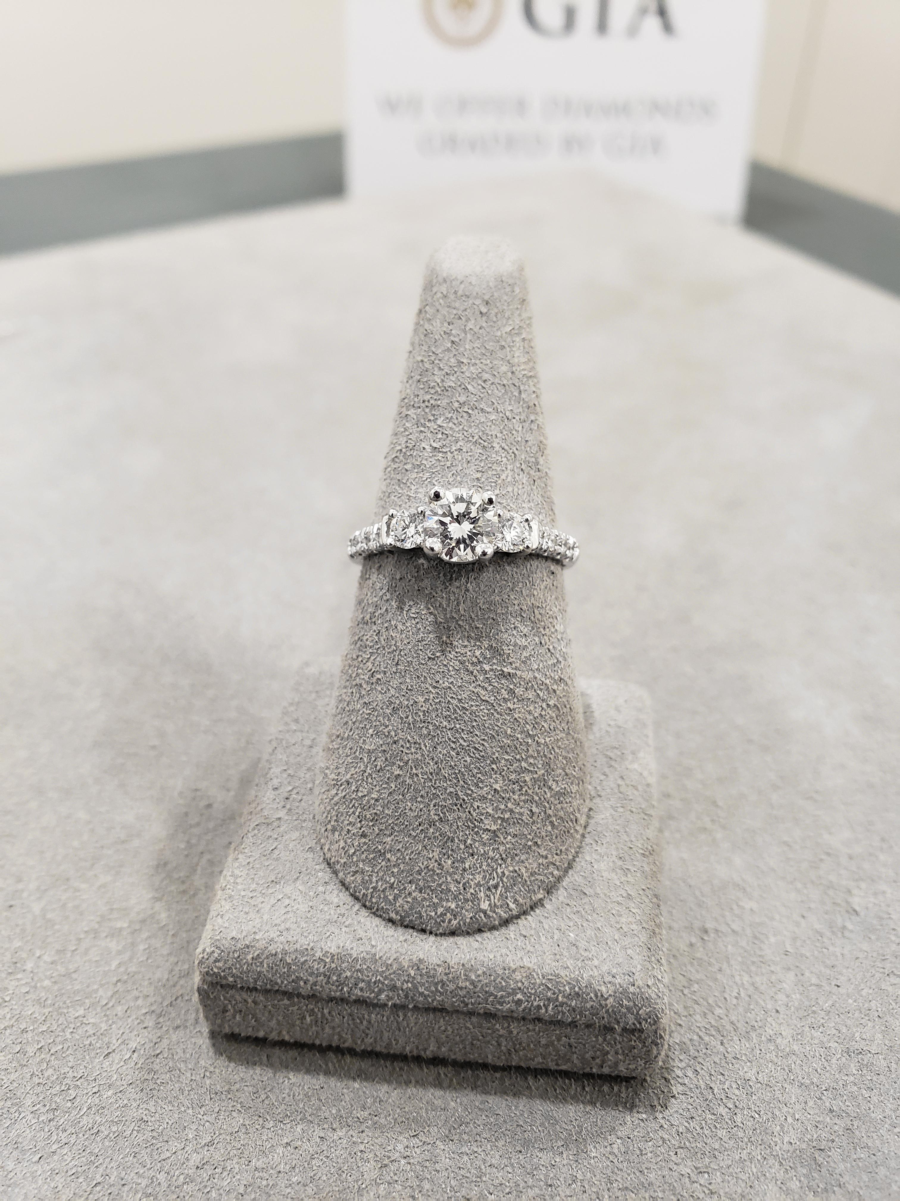 three stone pave engagement ring
