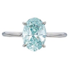 Oval Brilliant Statement Fancy Color A Crown-Worthy Fancy Rarity  Diamond Ring