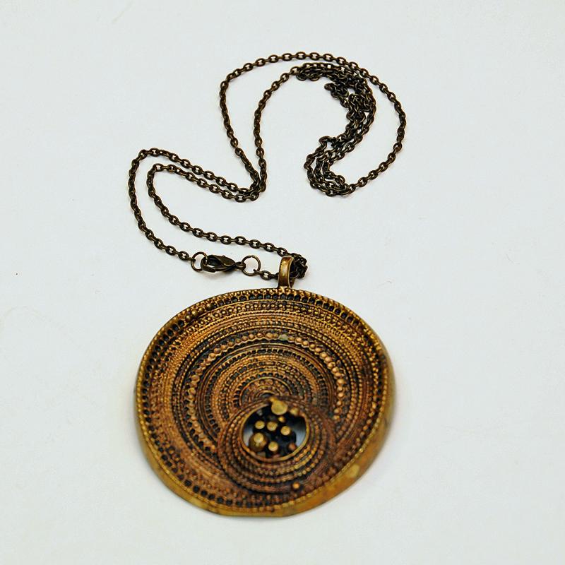 Late 20th Century Round Bronze Pendant Necklace Chick by Jorma Laine for Turun Hopea Finland 1970s