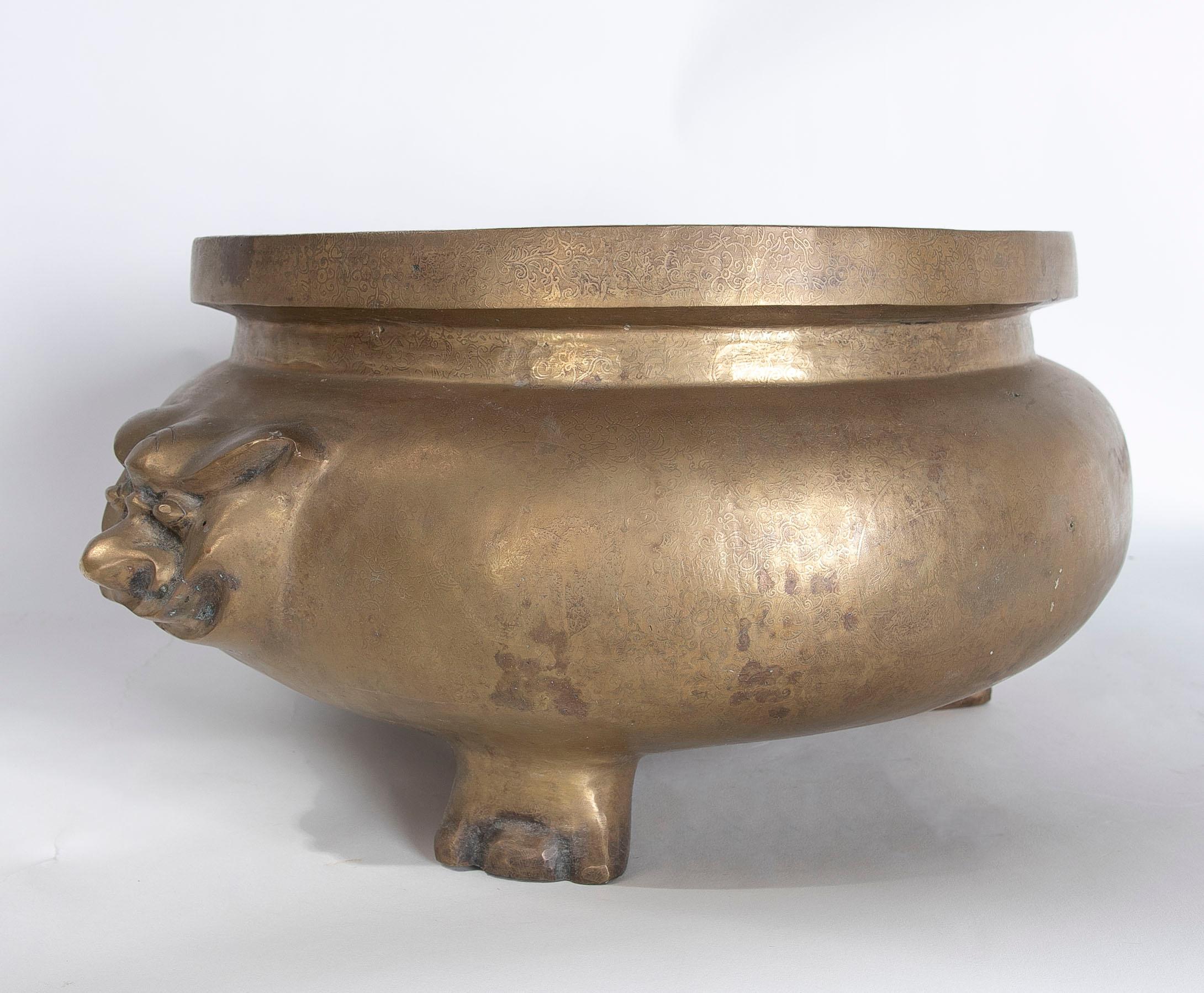 Mid-20th Century Round Bronze Vessel with Two-Sided Decoration and Foot-Shaped Feet For Sale