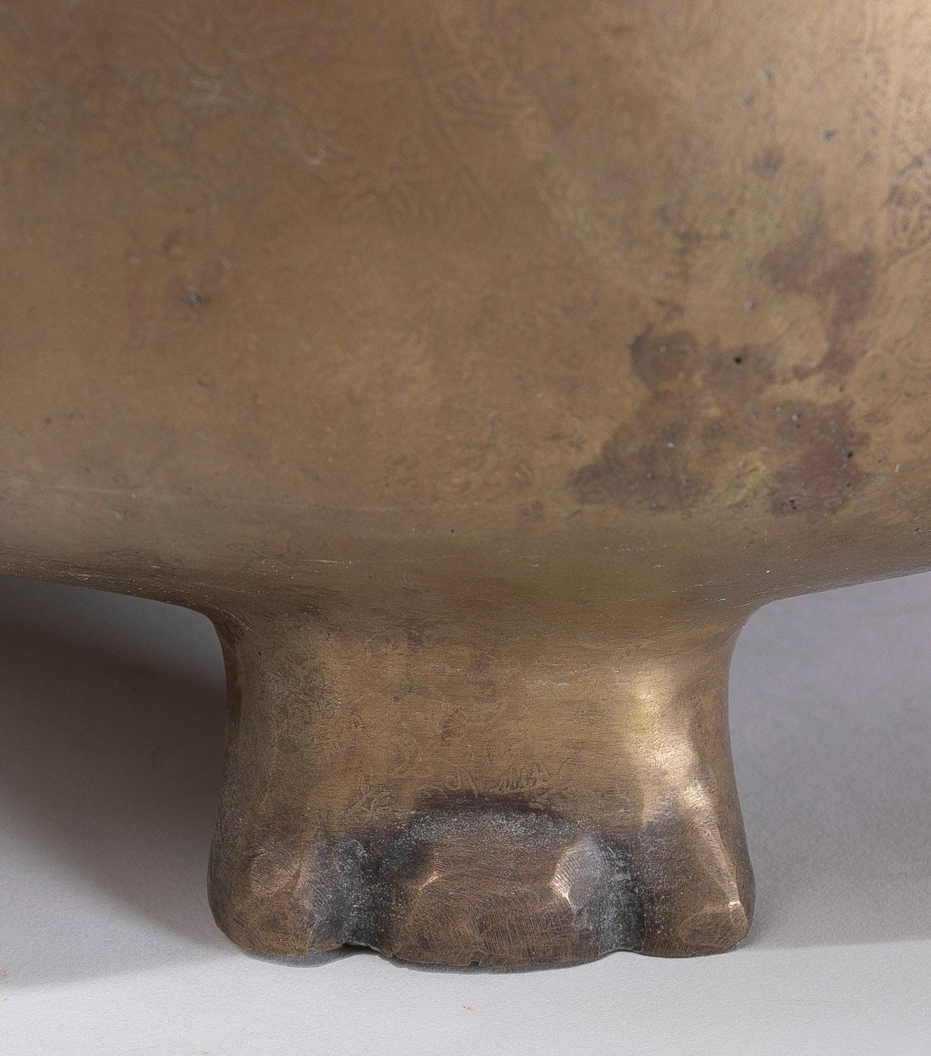 Round Bronze Vessel with Two-Sided Decoration and Foot-Shaped Feet For Sale 3