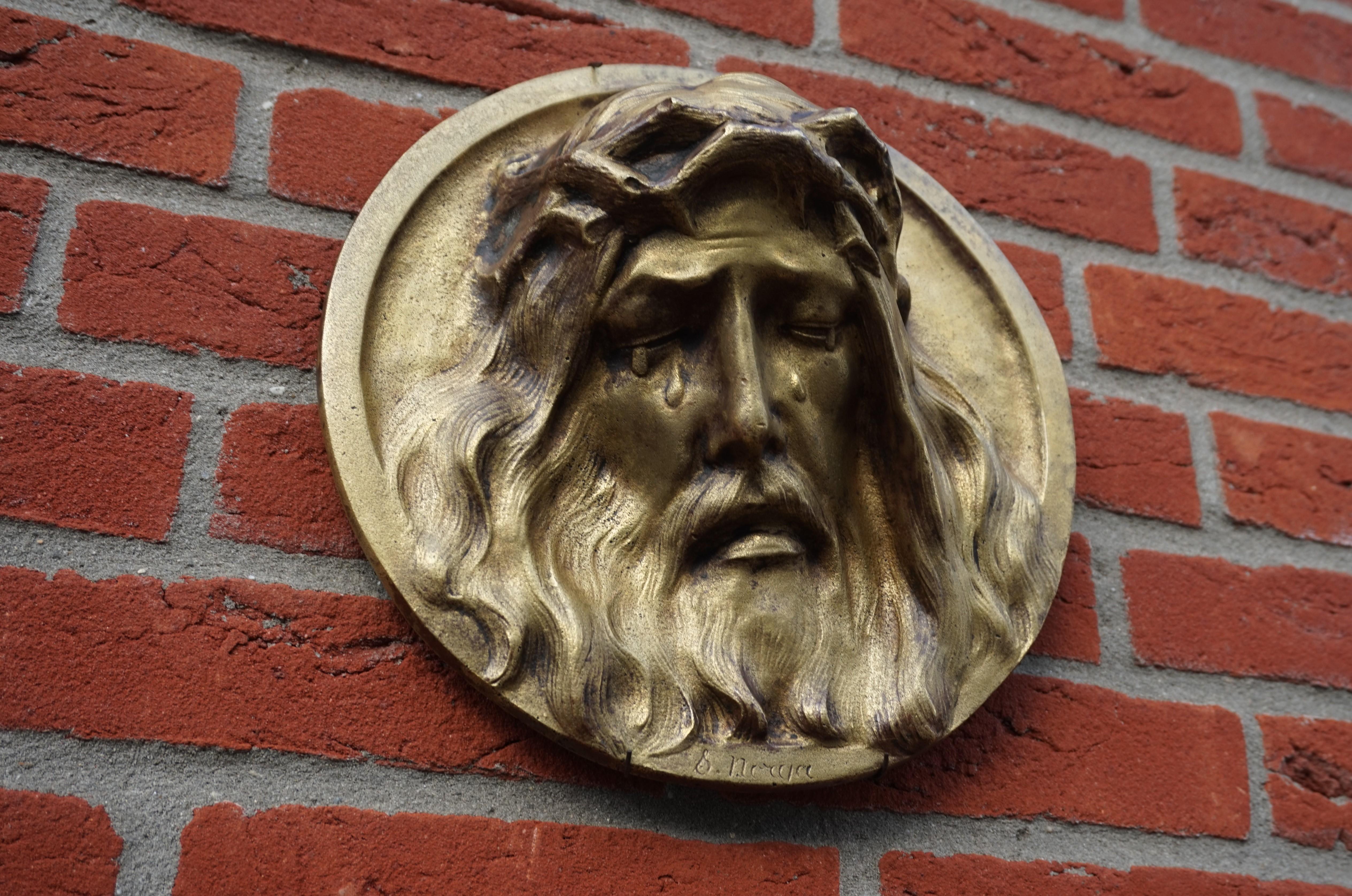 Belgian Round Bronze Wall Plaque Depicting a Suffering Christ in Tears by Sylvain Norga For Sale