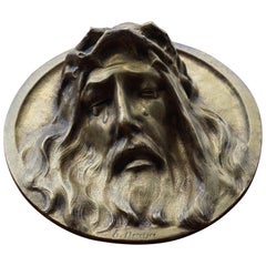 Runde Bronze-Wandtafel mit der Darstellung eines aufrüttelnden Christus in Tränen aus Bronze von Sylvain Norga