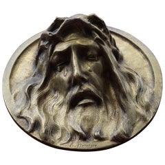 Antique Round Bronze Wall Plaque Depicting a Suffering Christ in Tears by Sylvain Norga