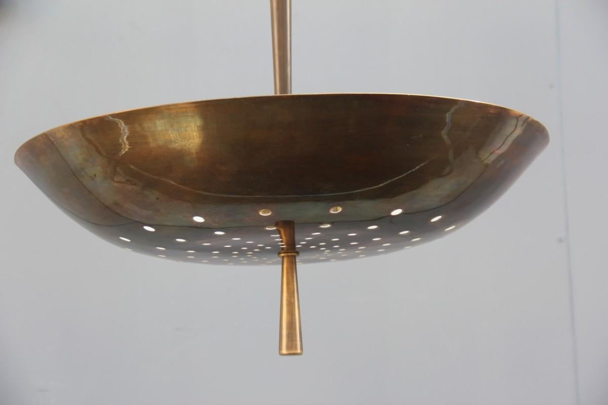Round bronzed modern Italian chandelier style Arteluce Arredoluce metal brass.