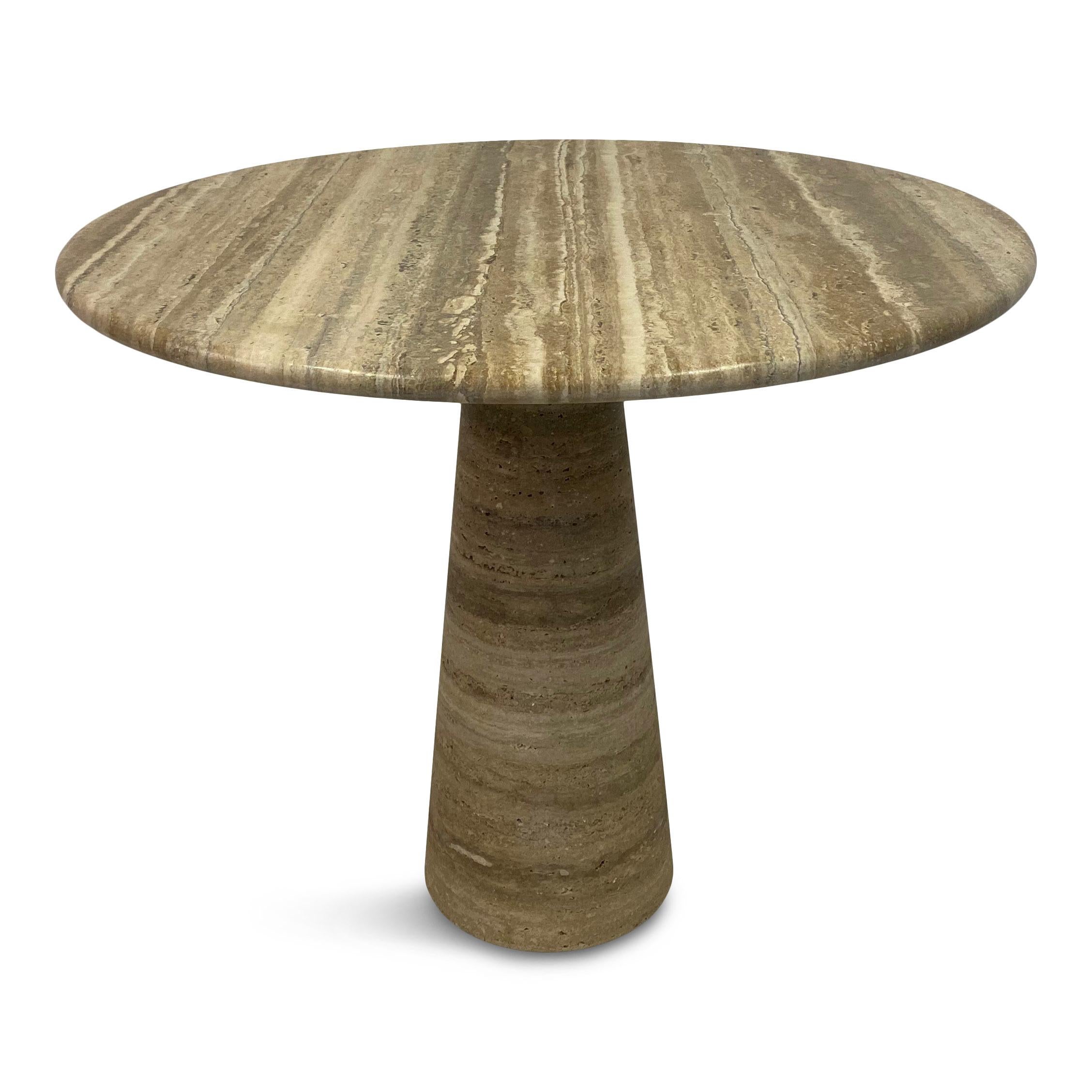 Round centre table.

Darker grained travertine

Tapering conical base

Rounded edges

Made to order in Italy

Size can be customised