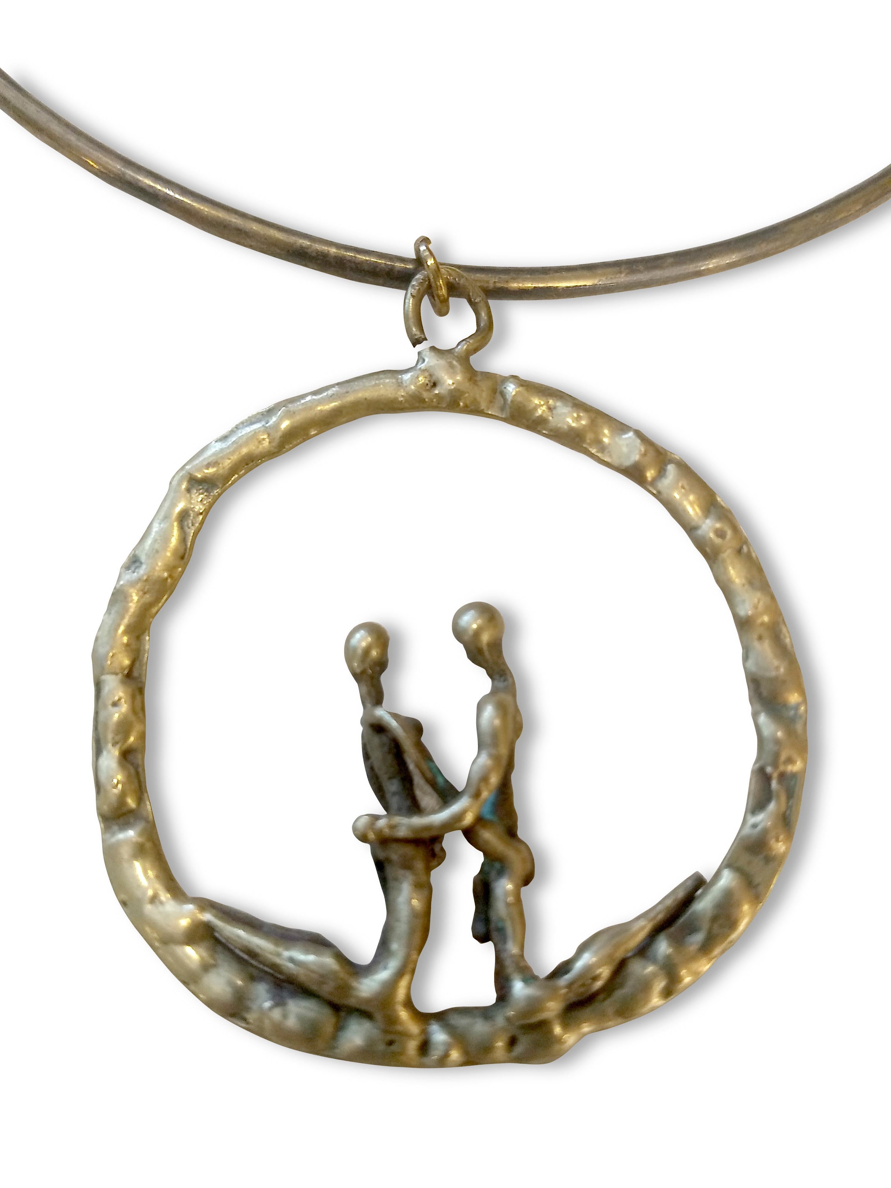 Hand-Crafted Round brutalist brass pendant with loving couple attributed to Pal Kepenyes