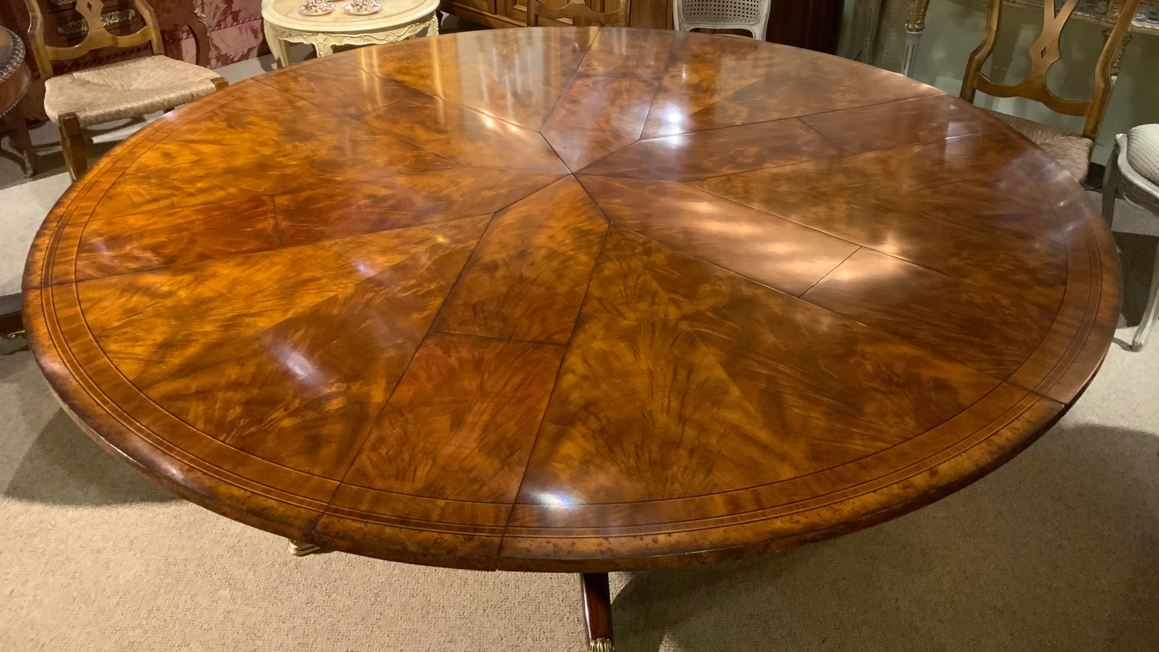 American Round burled wood  Jupe dining table by Theodore Alexander