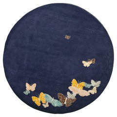 Tapis tibétain rond papillon : bleu, rose, orange. Laine et soie, sur mesure