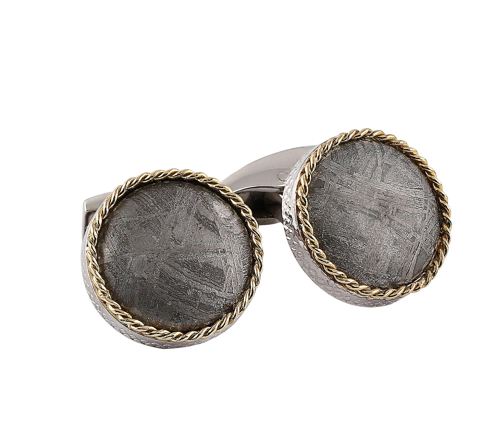 Showcase your unique sense of style in these limited edition round cufflinks. Rare natural meteorite forms an unusual centrepiece – each Muonionalusta meteorite fragment is over 30,000 years old, with a natural patterned surface. Encased in sterling