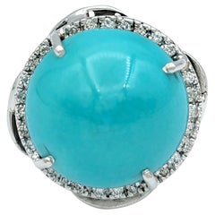 Bague cocktail en or 14 carats avec turquoise ronde taillée en cabochon et halo de diamants