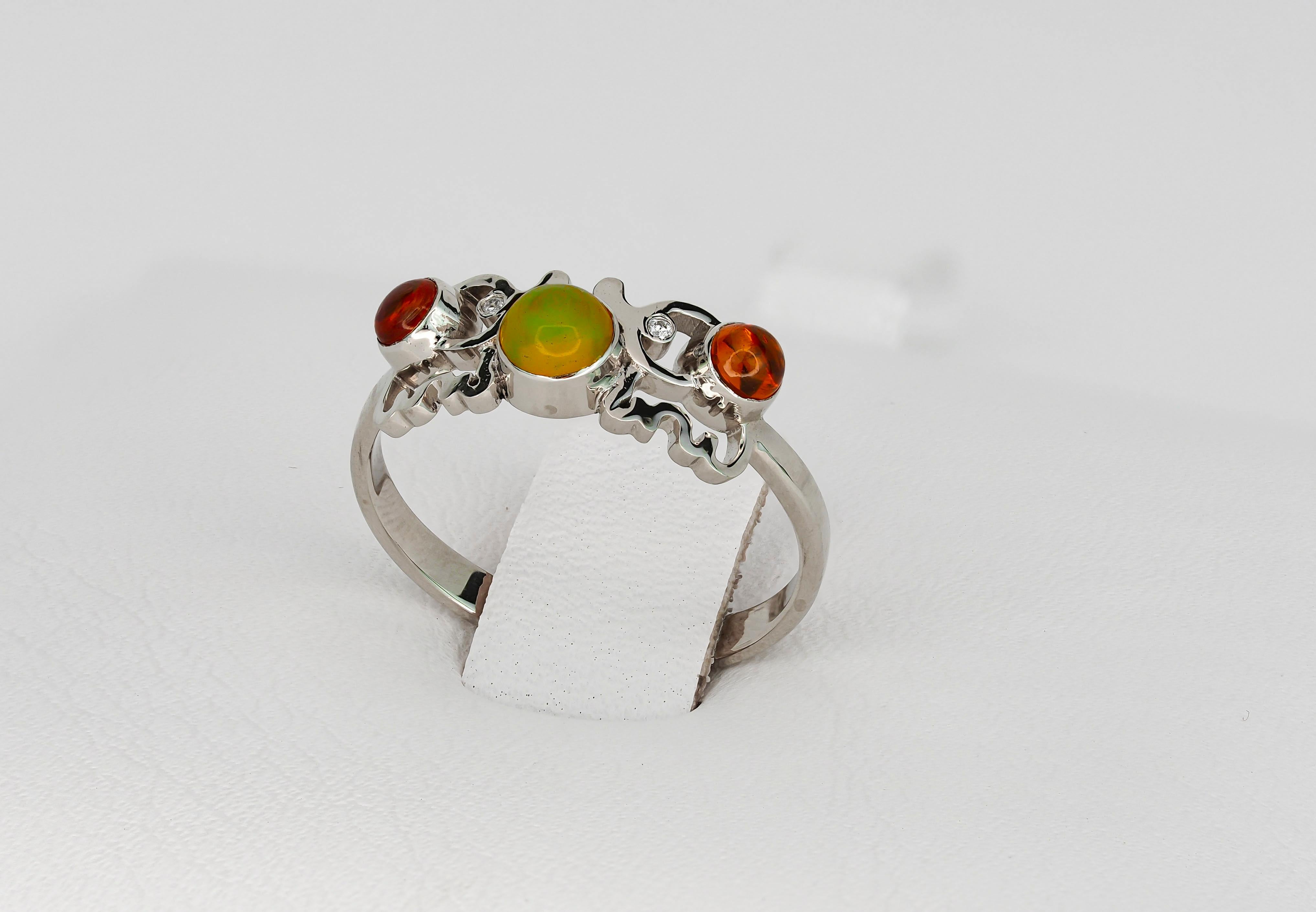 Cabochon Round cabochon opal ring in 14k gold.  For Sale