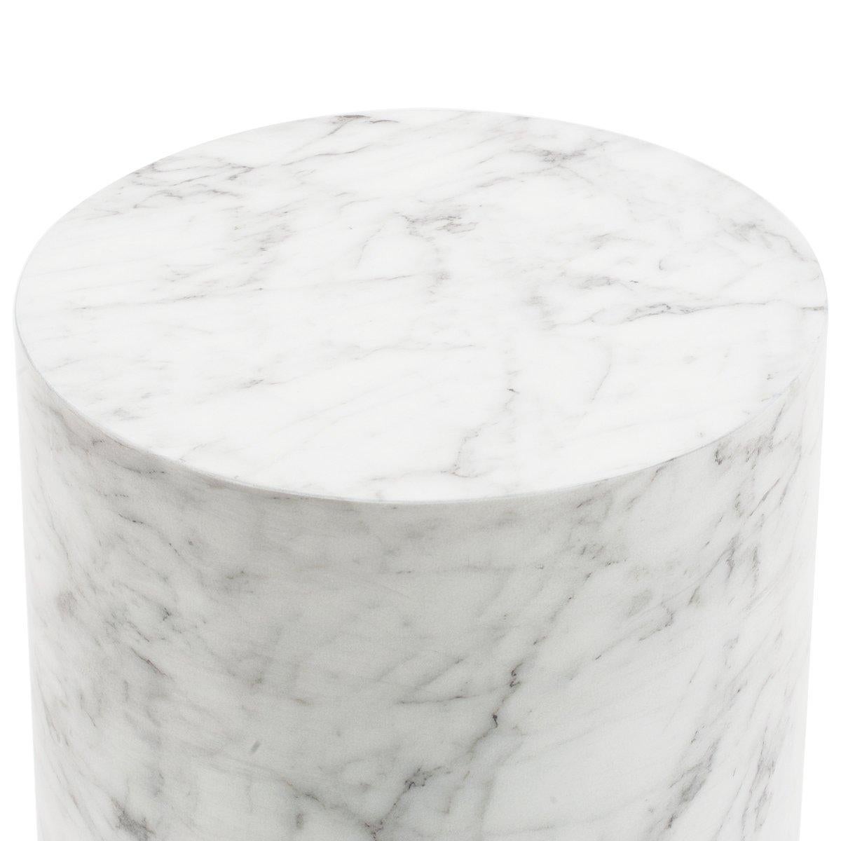 Stunning round side table in Carrera marble with a smooth, satin polished finish.