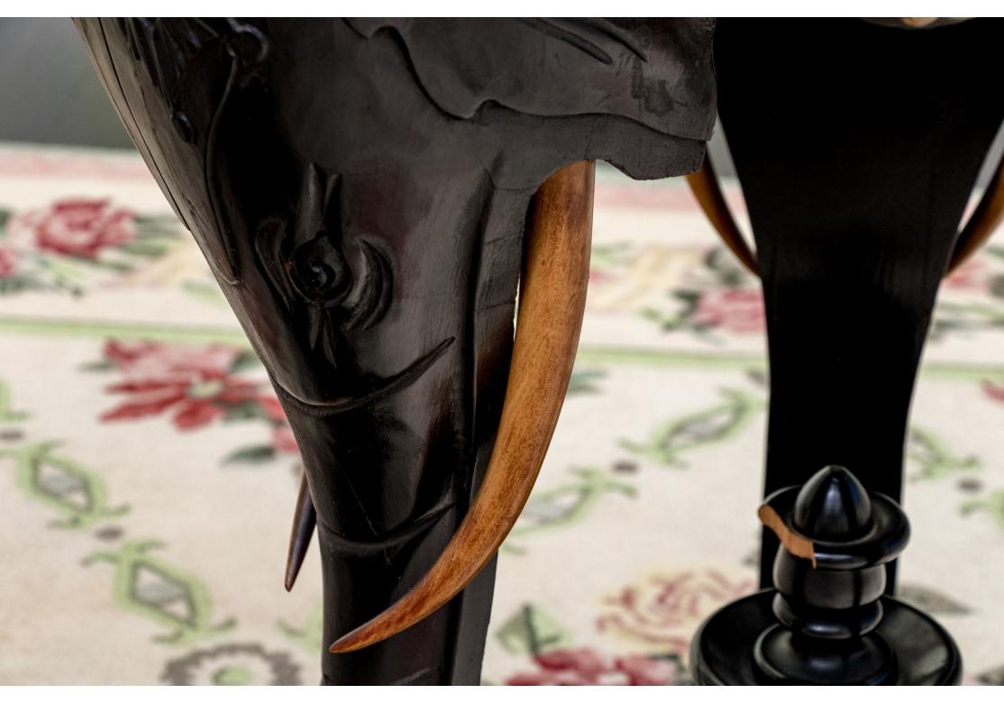 Hollywood Regency Round Carved Elephant Head Ebonized Pedestal Table For Sale