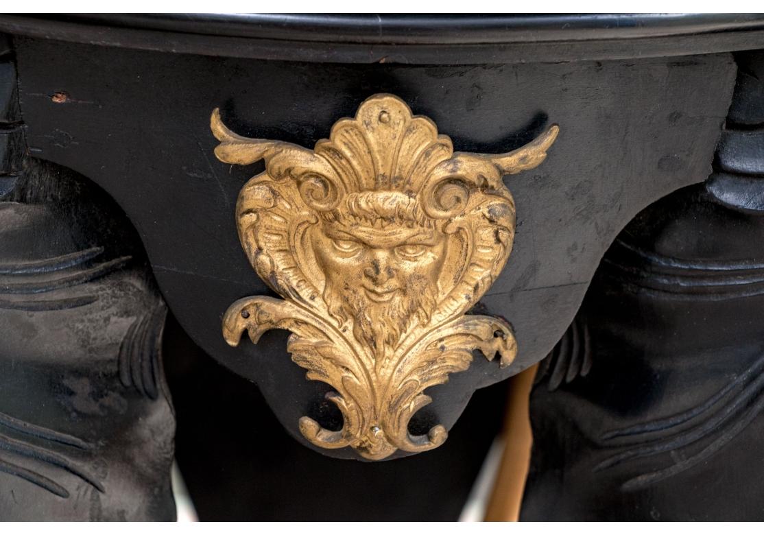 Round Carved Elephant Head Ebonized Pedestal Table In Distressed Condition For Sale In Bridgeport, CT