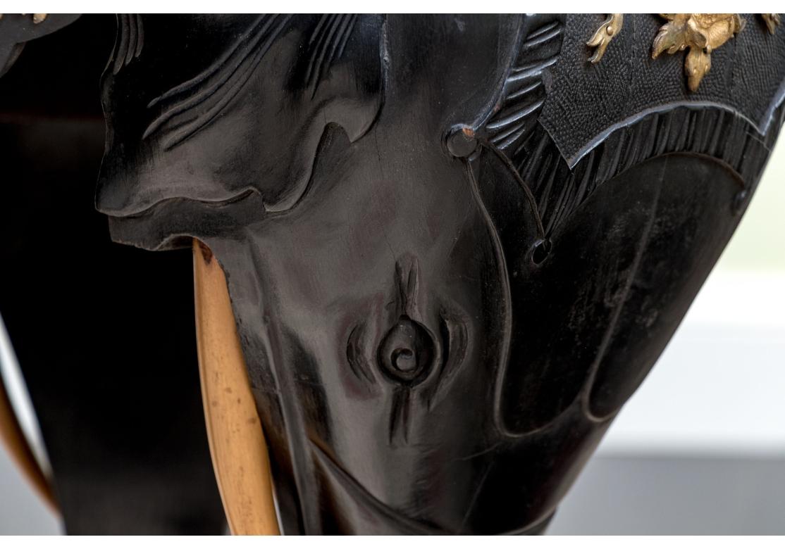 20th Century Round Carved Elephant Head Ebonized Pedestal Table For Sale
