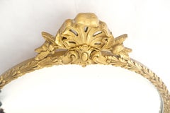 Specchio da parete barocco rotondo intagliato in legno dorato con fiori di loto del 1920 ca.