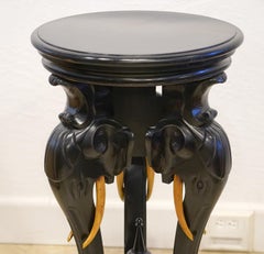 Round Carved Three Elephant Heads Rotating Top Ebonized Pedestal by R. J. Horner
