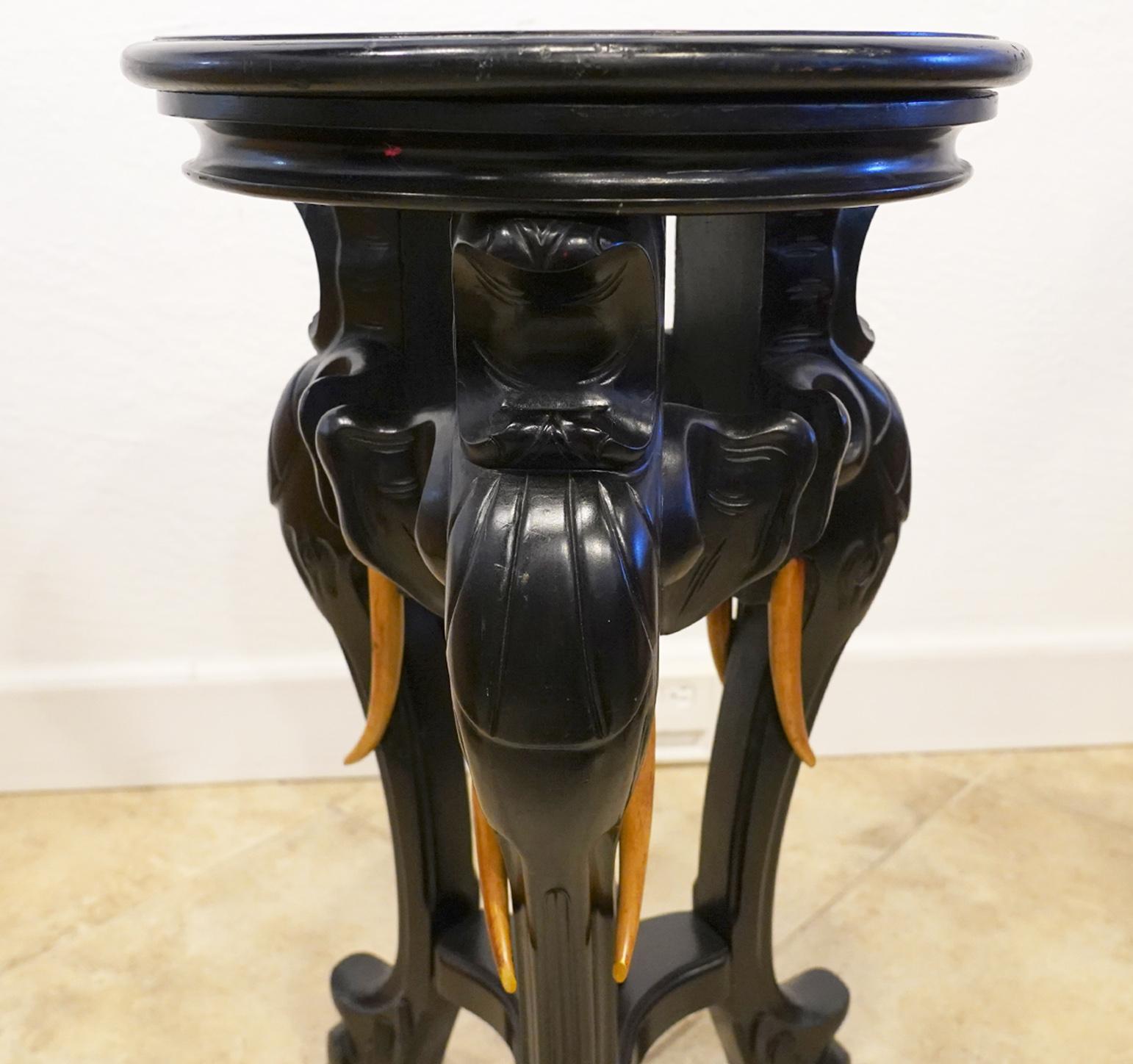 Wood Round Carved Three Elephant Heads Rotating Top Ebonized Pedestal by R. J. Horner