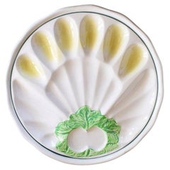Piatto da portata in ceramica maiolica d'epoca a forma di uovo o di ostrica in verde e giallo