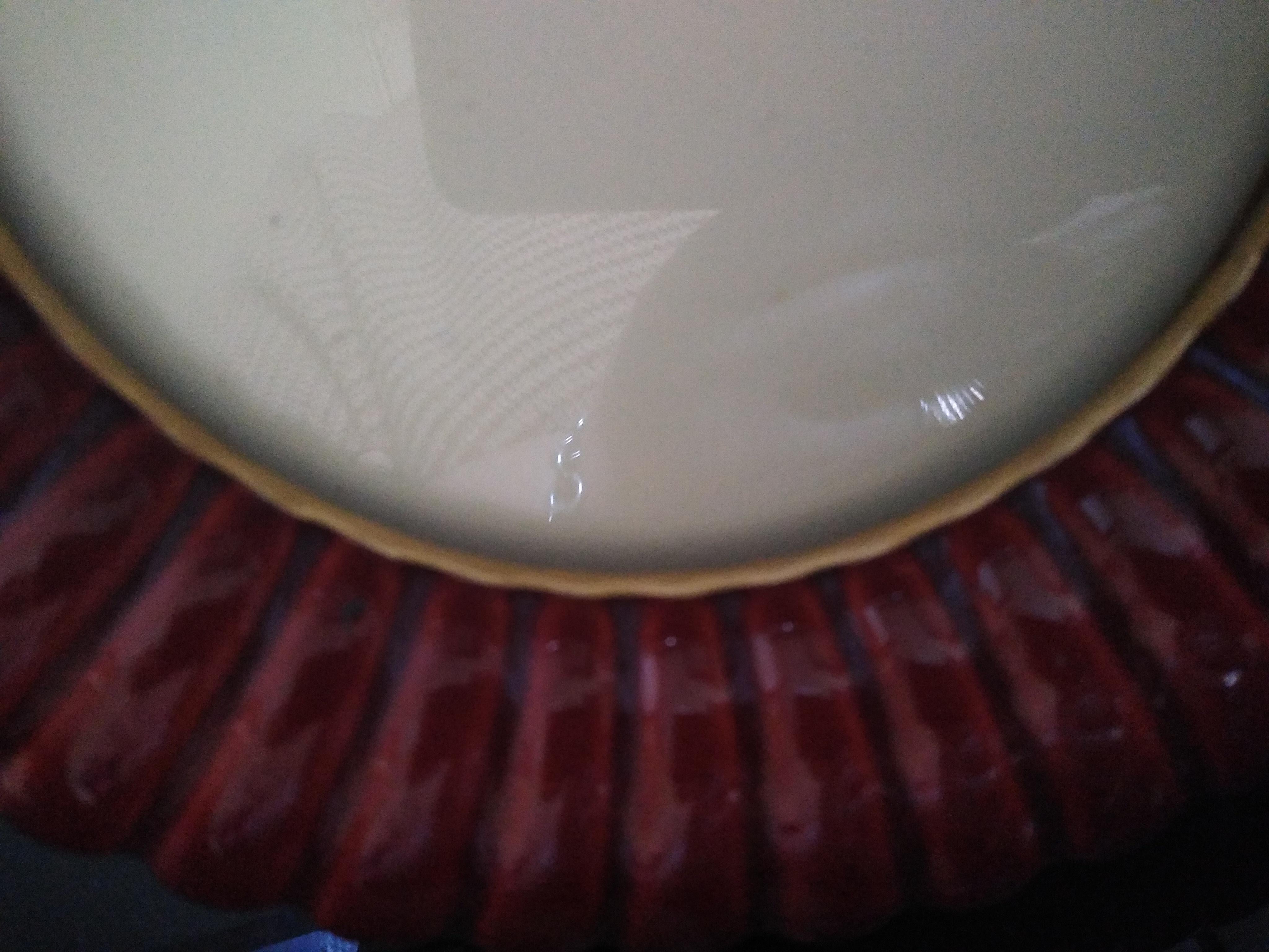 Round burgundy ceramic frame in the style of Tommaso Barbi.
In good vintage condition