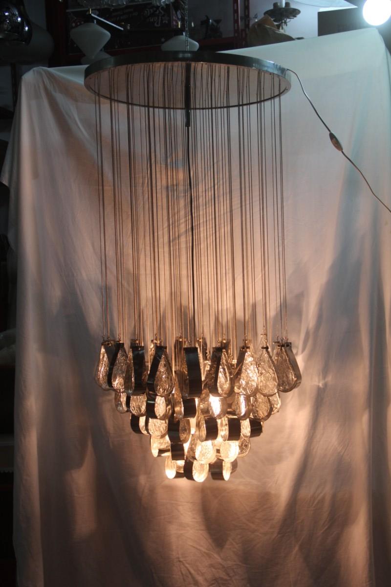 Round chandelier Waterfall drops steel glass with chains Murano glass 1970s Italian design.

4-light bulbs E27 max 80 watts each.