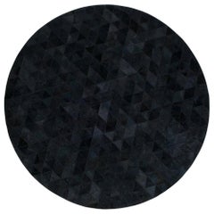 Tapis rond personnalisable Trilogia en cuir de vache anthracite de taille moyenne