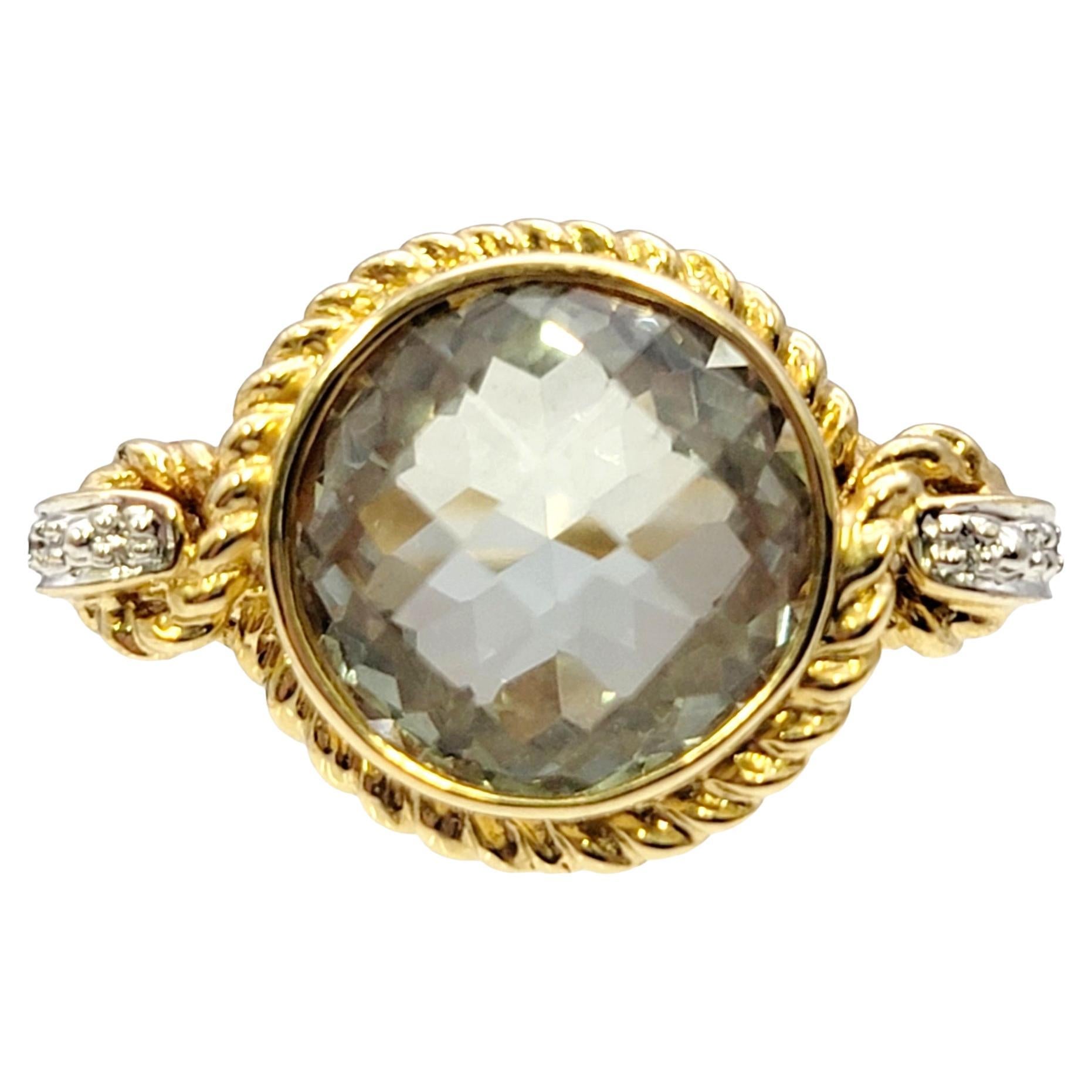 Ring size: 5.5

Stunningly designed prasiolite solitaire ring with diamond accents. This remarkable light green checkerboard cut stone is surrounded by incredible detail work, with delicate swirling loops and a twisted rope design in a warm 14K