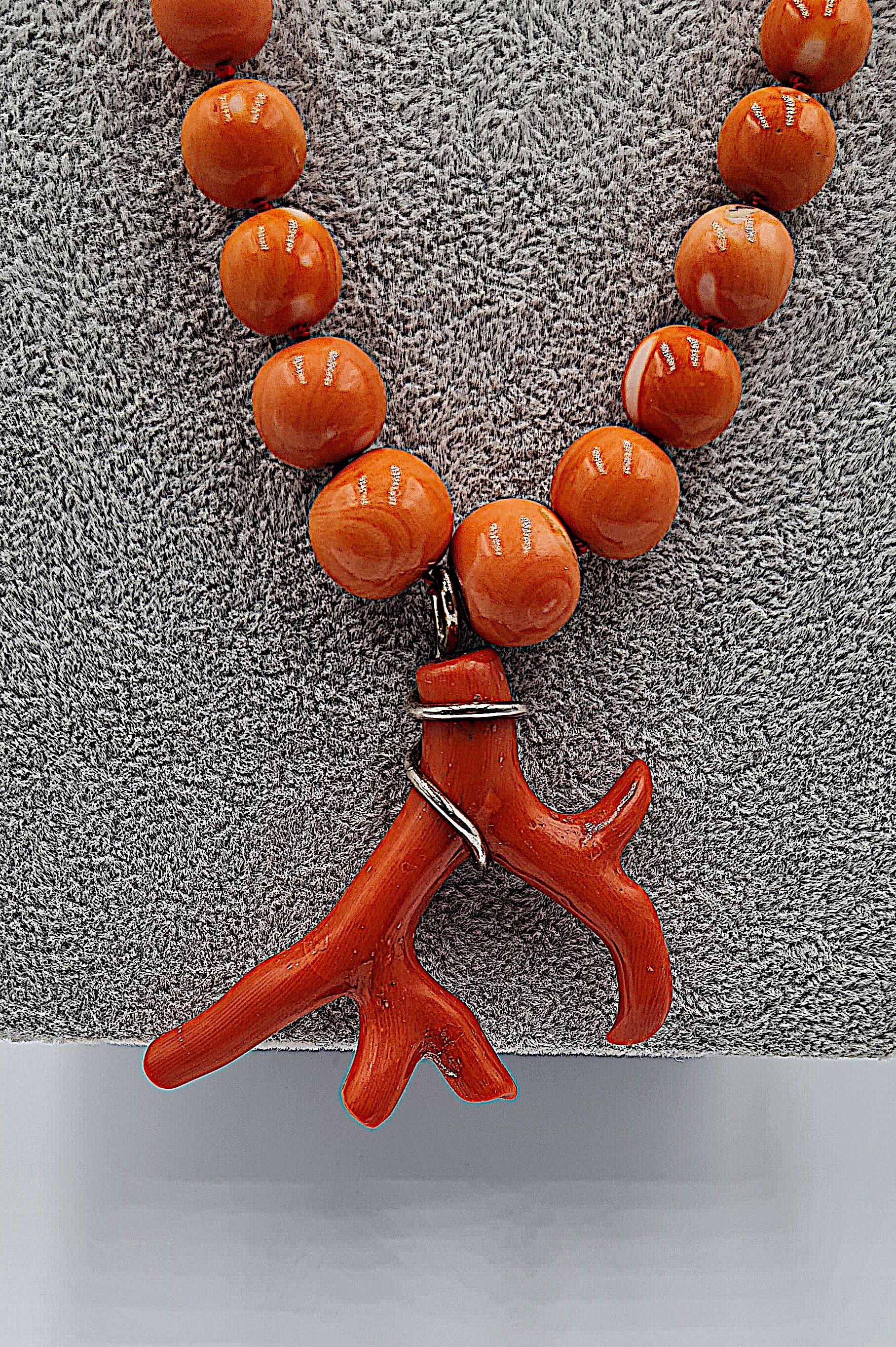 Round cherry coral necklace with silver clasp. 
Handmade in Italy about 30 years ago
