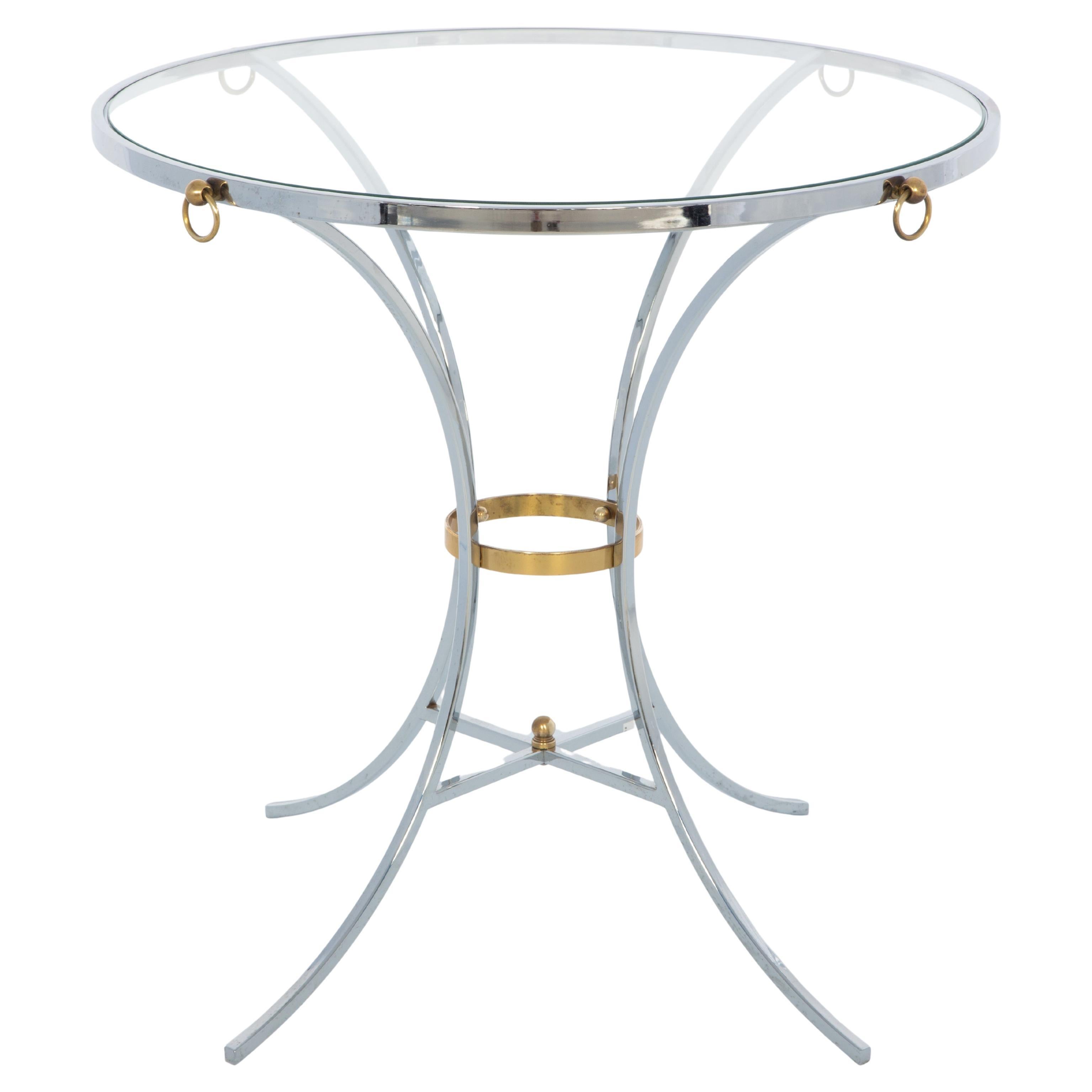 Gueridon rond en chrome avec accents en laiton et dessus en verre