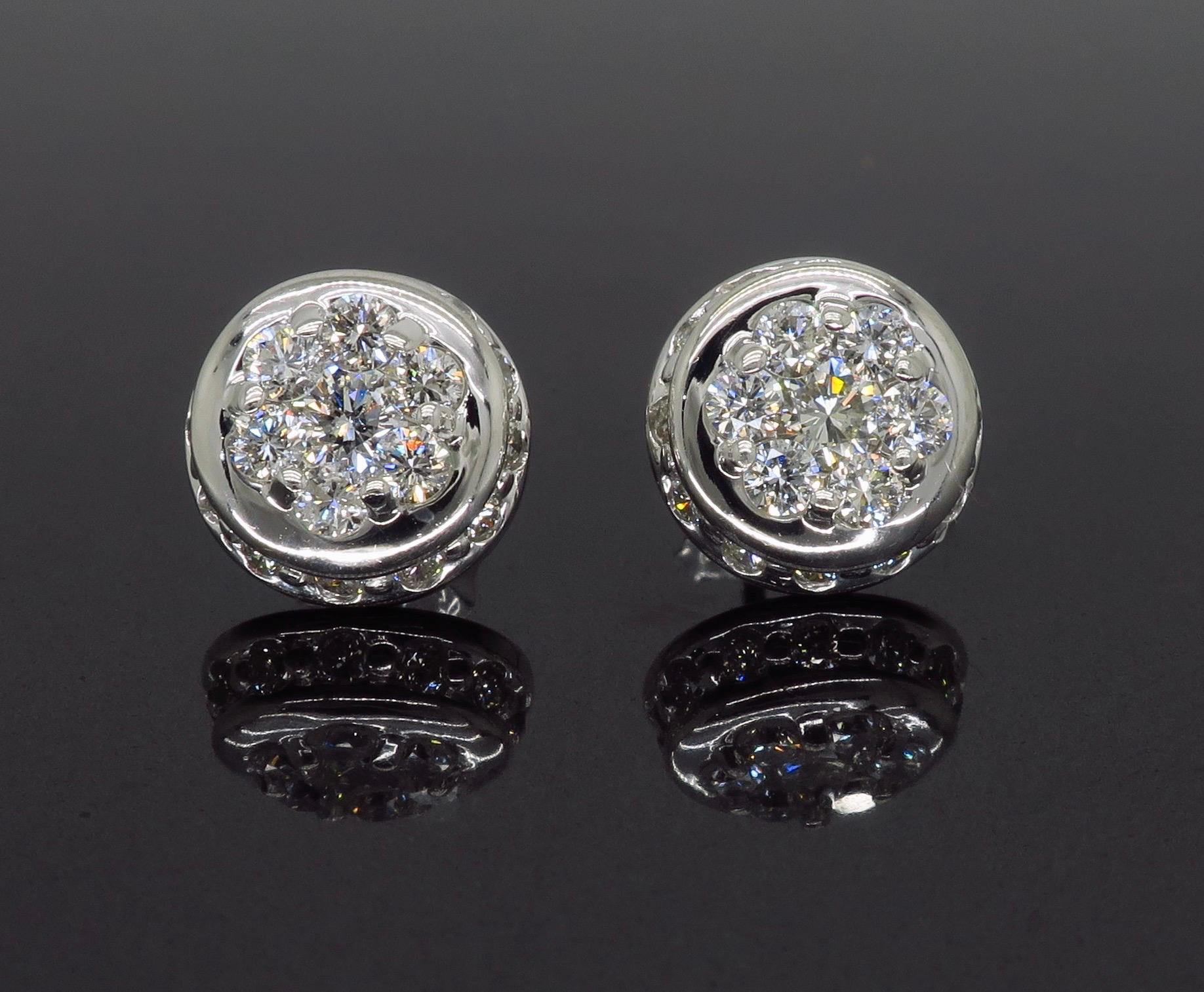 Unique cluster diamond earrings crafted in 14k white gold.

Diamond Carat Weight: .75CTW
Diamond Cut: Round Brilliant Cut Diamonds
Color: Average G-H
Clarity: Average VS
Metal: 14K White Gold
Marked/Tested: Stamped “14K