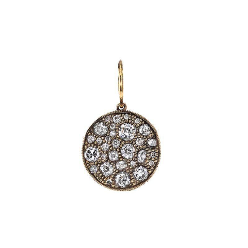 Approximately 1.60ctw varying old cut and round brilliant cut diamonds in a handcrafted 18k yellow gold charm. Available in a polished or oxidized finish. Price does not include chain and may vary according to total diamond weight. 

*Cobblestone