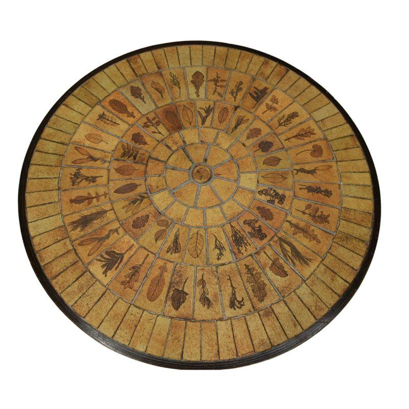 Coffee table 1970 ceramic tiles signed Capron with leaves of dimension diameter 95 cm for a height of 34 cm.

Additional information:
Style: Vintage 1970
Material: Exotic wood, Earthenware & Ceramic.