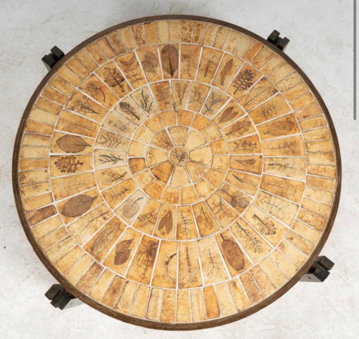 Round Coffee Table by Roger Capron, France, 1970s. Tile and stained wood; signed in tile; decorated with beautiful botanical designs.