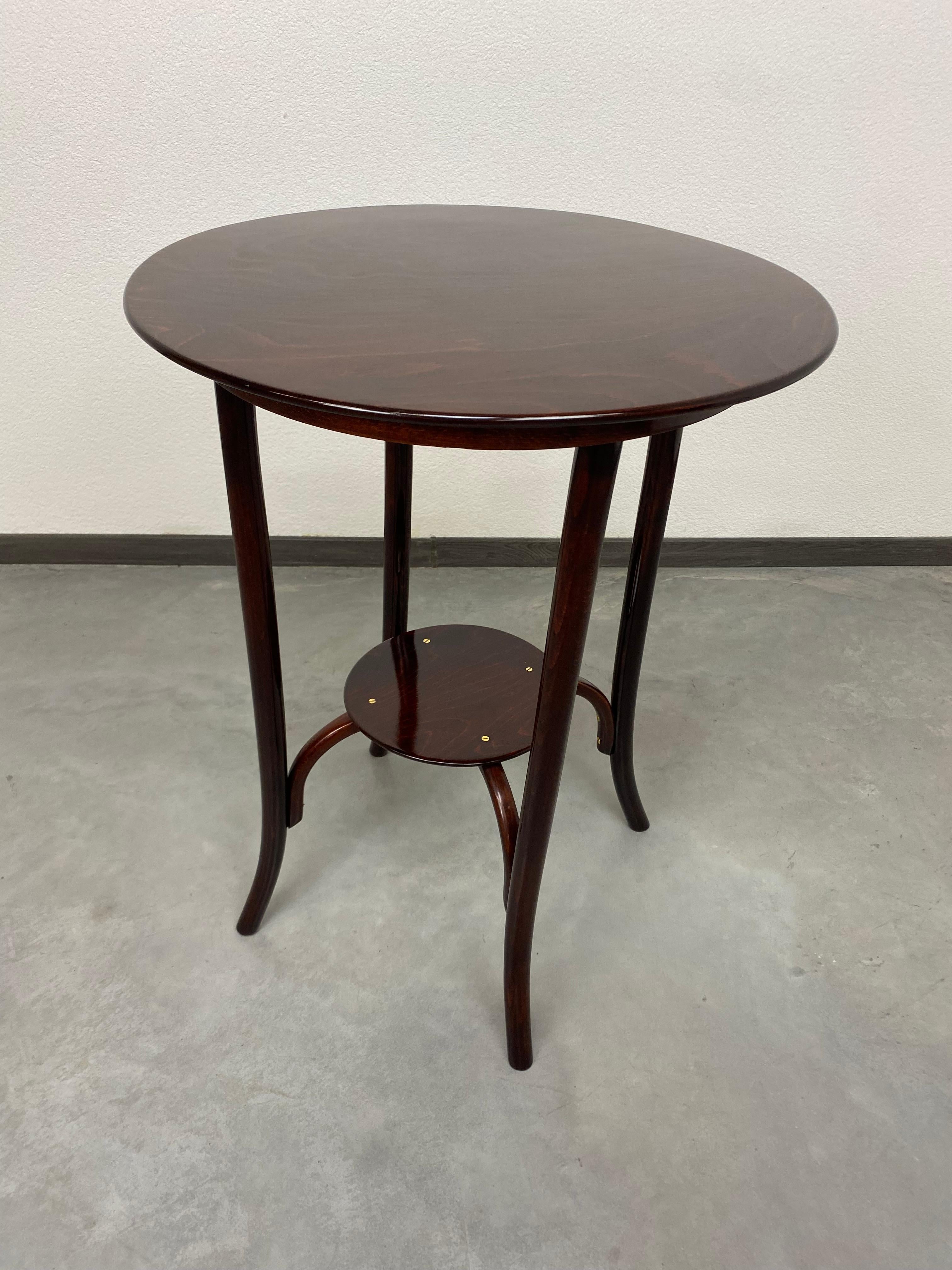 Round coffee table by Thonet professionally stained and repolished.