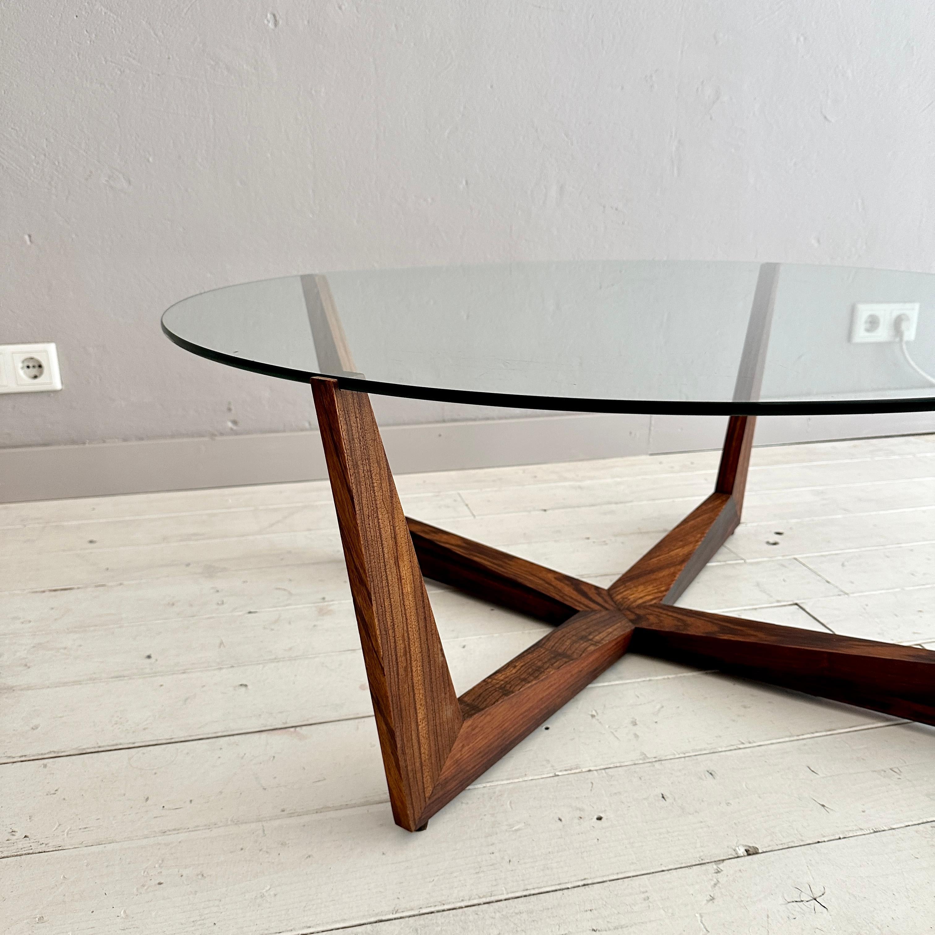 This rare Round Coffee Table by Wilhelm Renz was made out of Teak and Glass around 1960.
A unique piece which is a great eye-catcher for your antique, modern, space age or mid-century interior.
If you have any more questions we are very happy to