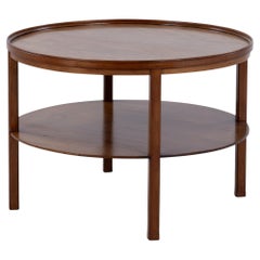 Round coffee table in mahogany by Kaare Klint