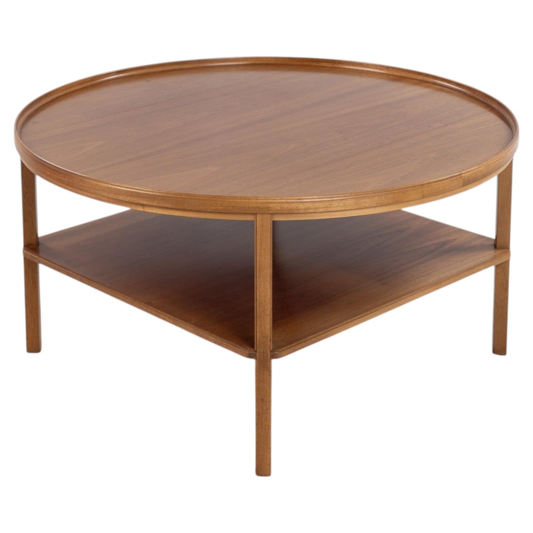 Round coffee table in mahogany by Kaare Klint