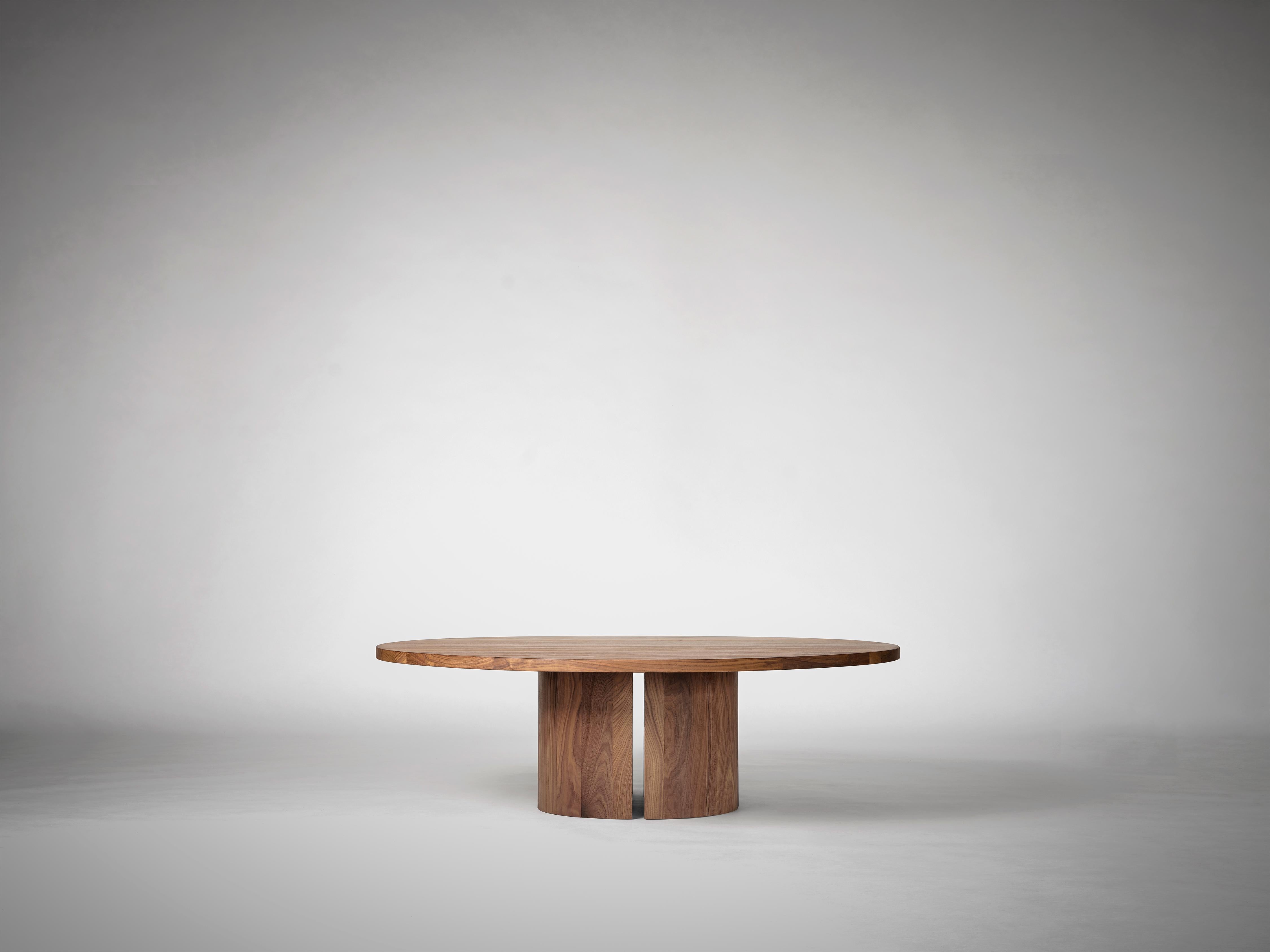 Inspired by light breaking through narrow voids in architectural structures, Aperta features a precise slit, creating a sense of lightness to its solid form. 
The Aperta Coffee Table Round has manually adaptable legs, allowing for 4 distinct