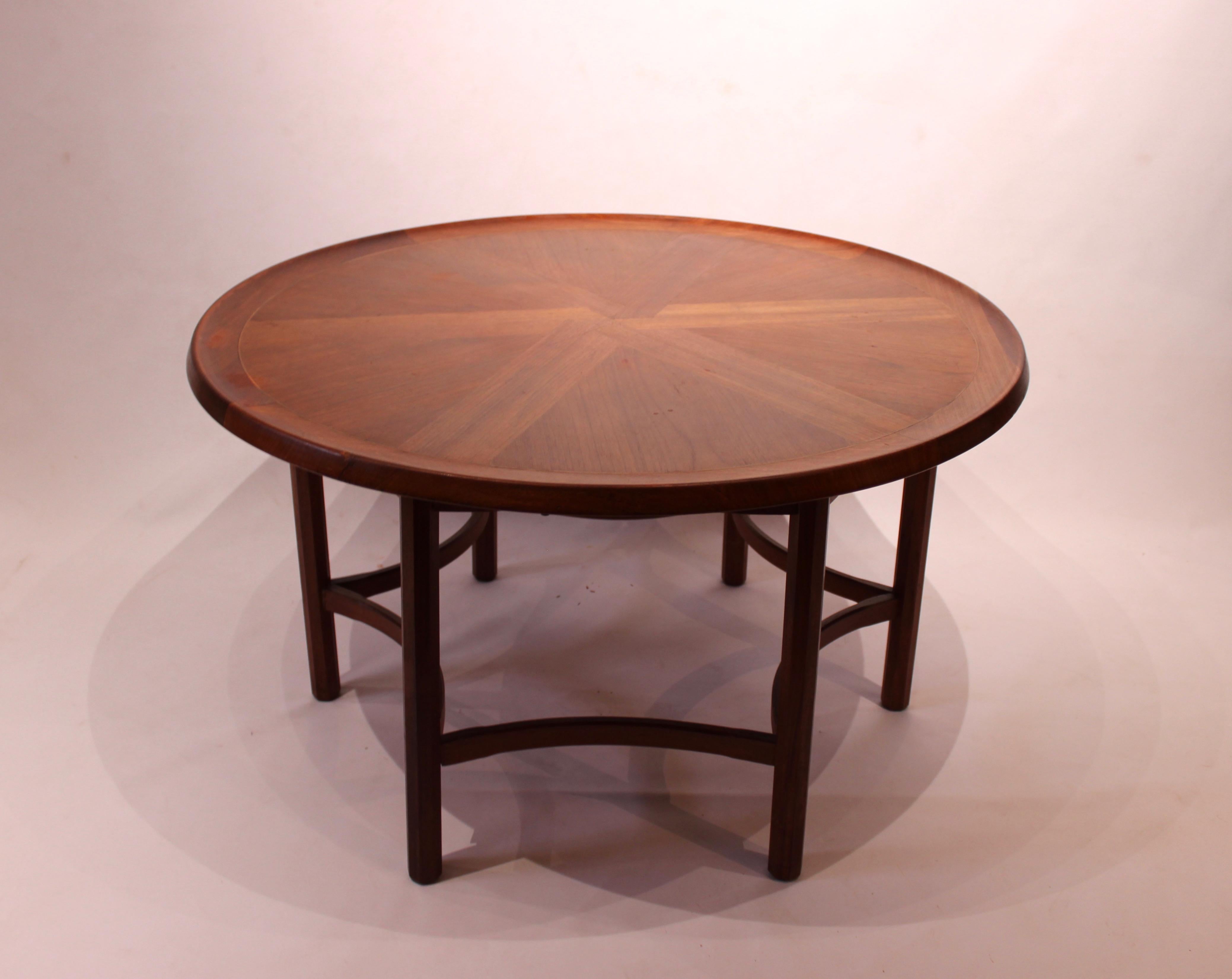 Round coffee table in teak of Danish design from the 1960s. The tabletop can be removed and the table is of great vintage condition.