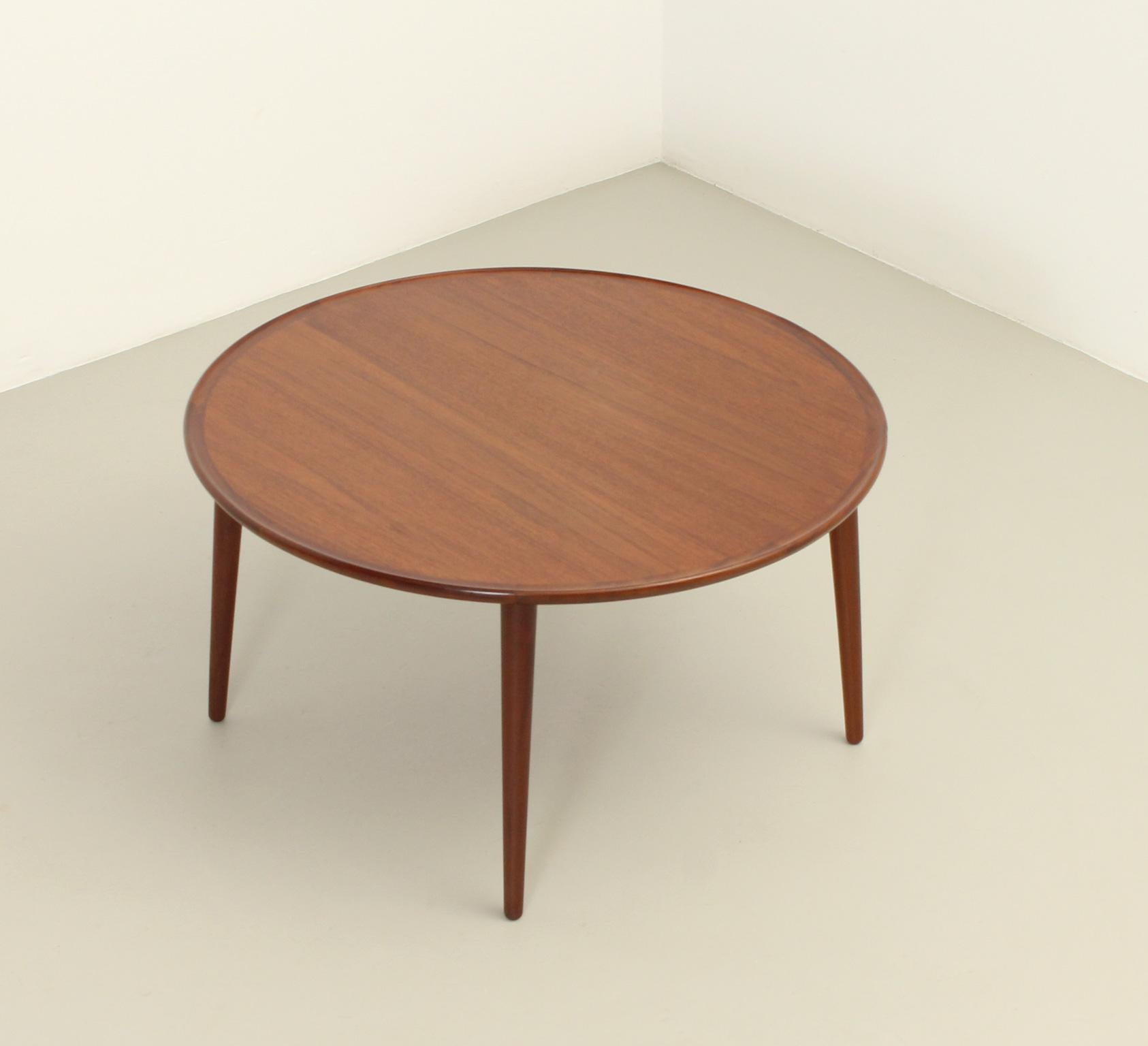 Round teak coffee table by BC Møbler, Denmark, 1960's. Solid teak wood with nice detailed edge, removable legs for an easy transport.