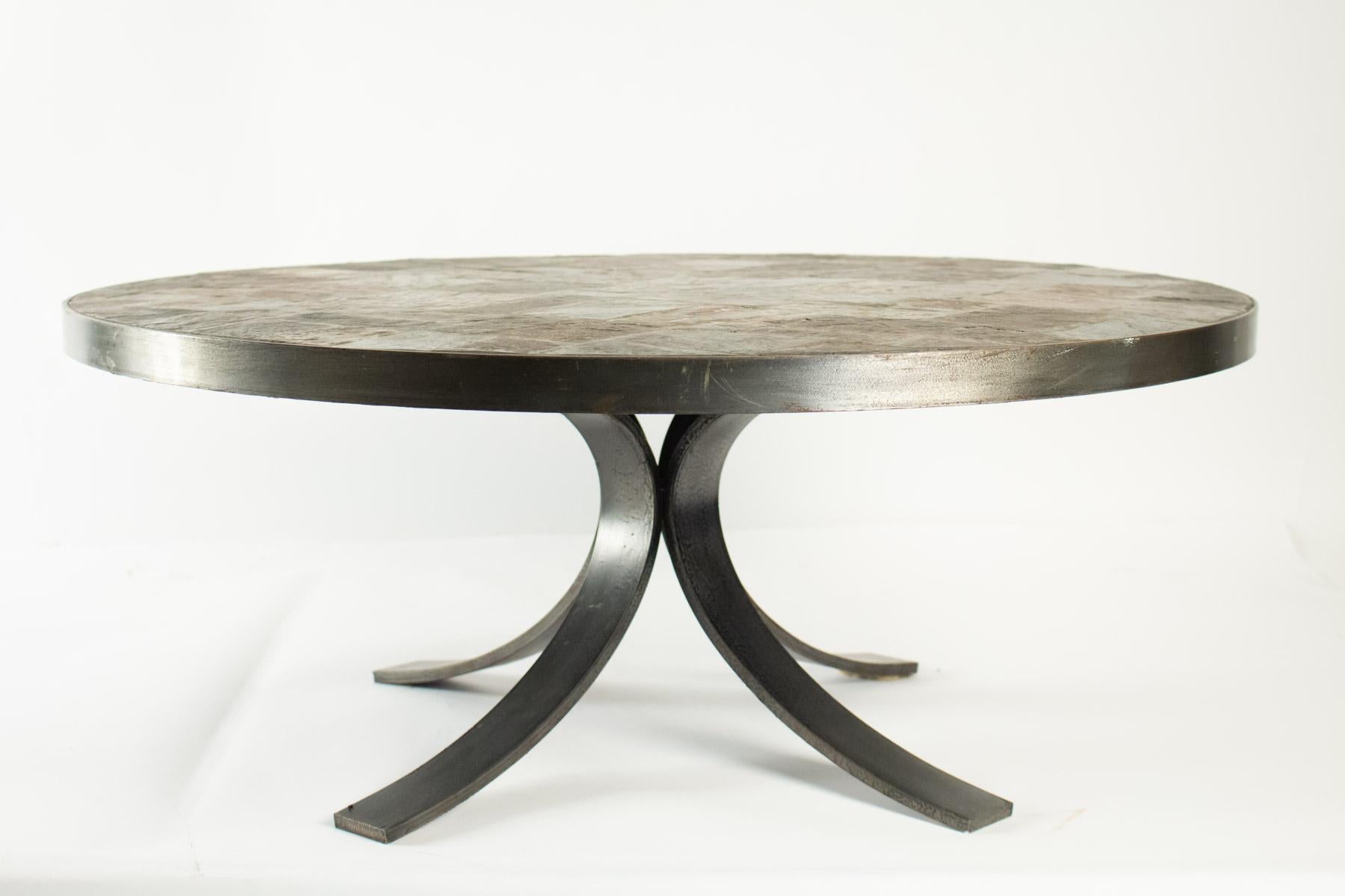 Round coffee table in wrought iron and stone from the Ardoise, circa 1960-1970
Measures: H 33 cm, D 80 cm.
  
